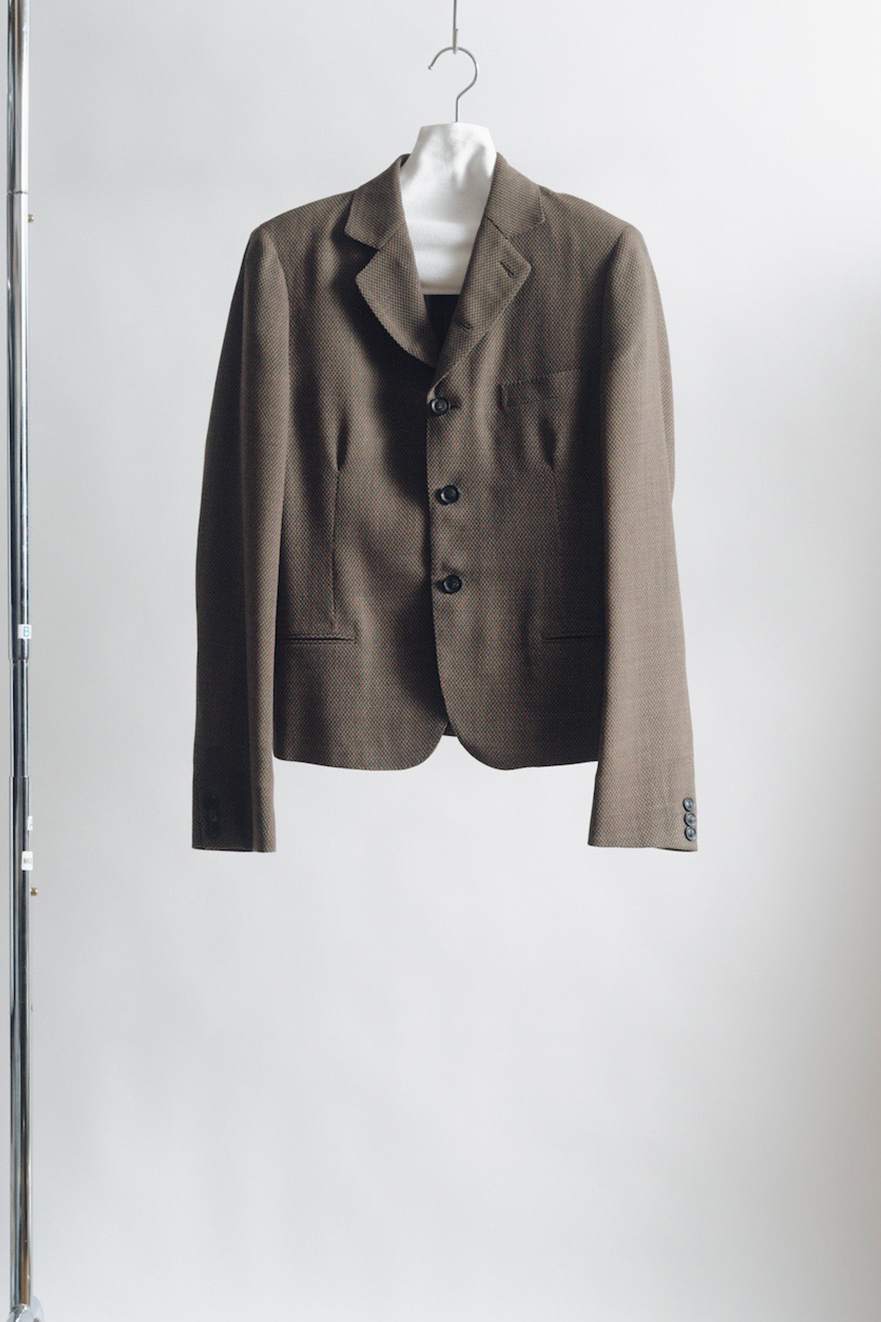SOSHIOTSUKI(ソウシオオツキ)のWOOL SERGE SLIM FIT JACKETの通販
