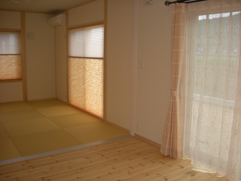 オレンジのカーテンとプリーツスクリーン | 香川県高松市のオーダー