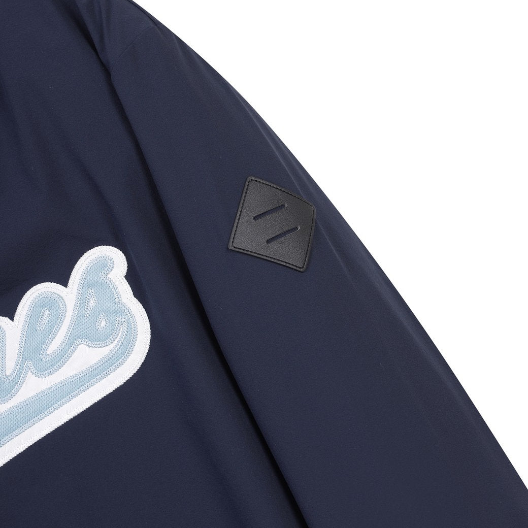 WAAC X JONES】WOMEN カーブロゴプルオーバー ネイビー