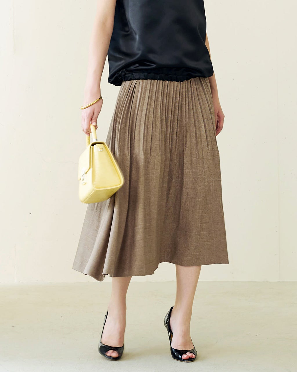 ウールライク・裾消しプリーツスカート/DoCLASSE