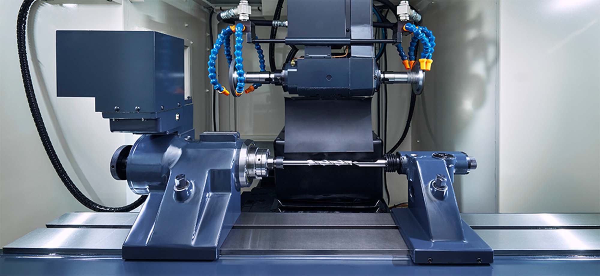 両センタタイプ高精密CNC工具研削盤 V3 | 牧野フライス精機株式会社
