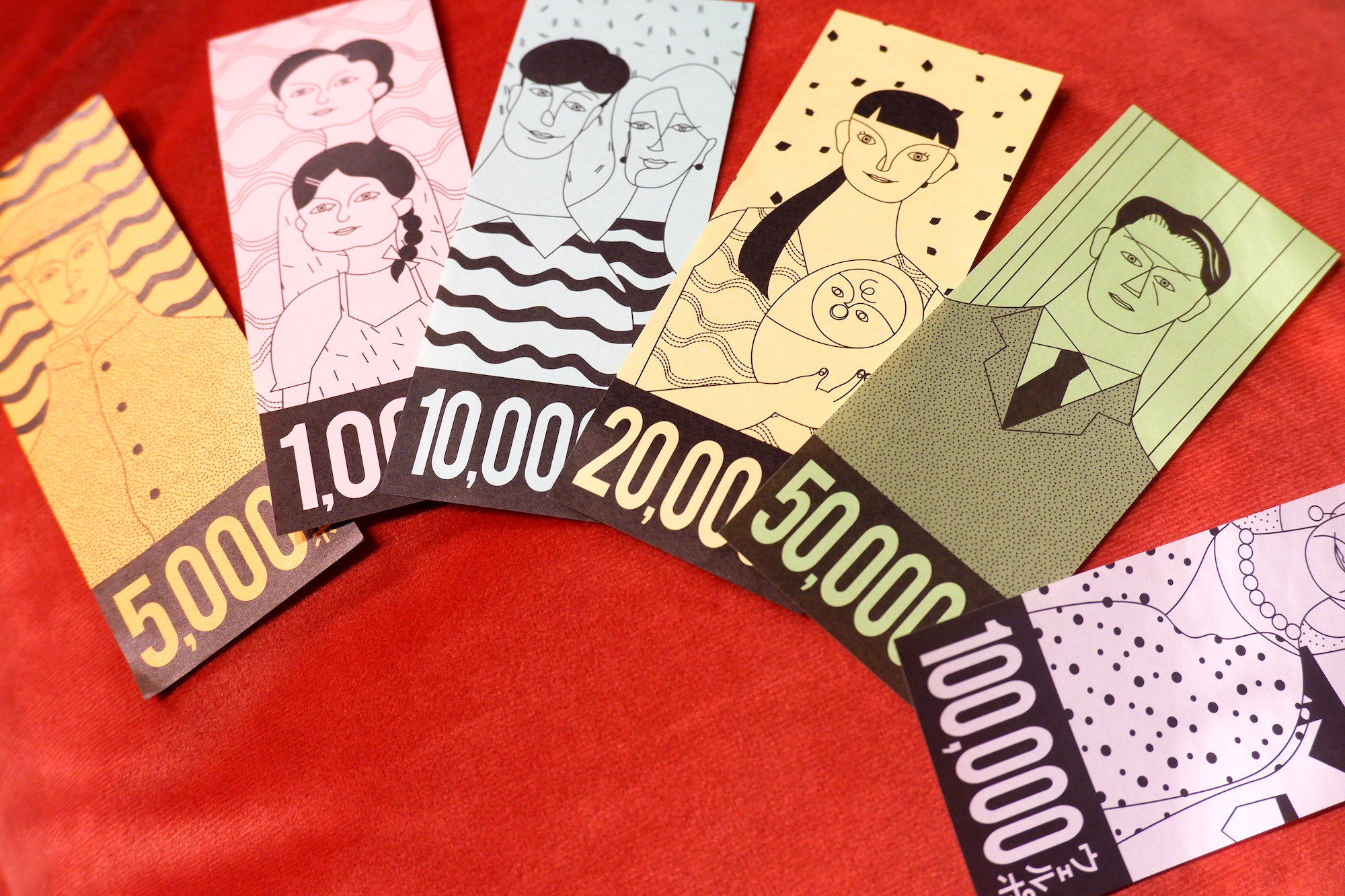 人生ゲーム新作は「億万長者を目指さない」。通貨は“幸福度”、実話が