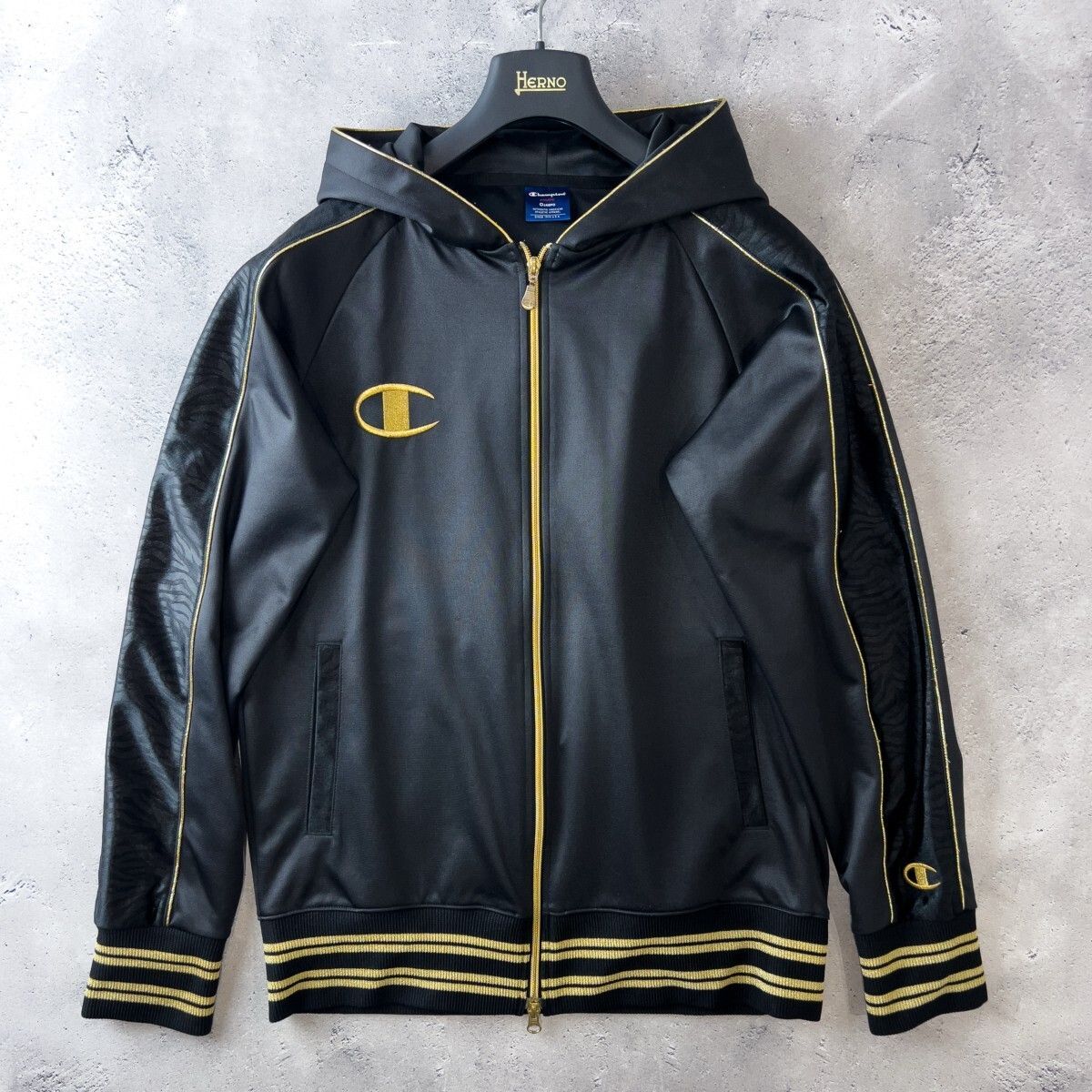 大人気! Champion × 魔裟斗 チャンピオン フーディ ジャージ