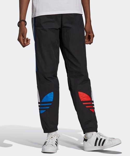 adidas（アディダス）の「アディカラー トラックパンツ（ジャージ