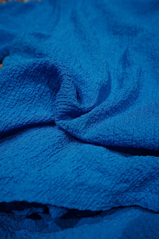 Omar Afridi(オマールアフリディ)25SSのAfridi DRAPED L/S TOP(BLUE