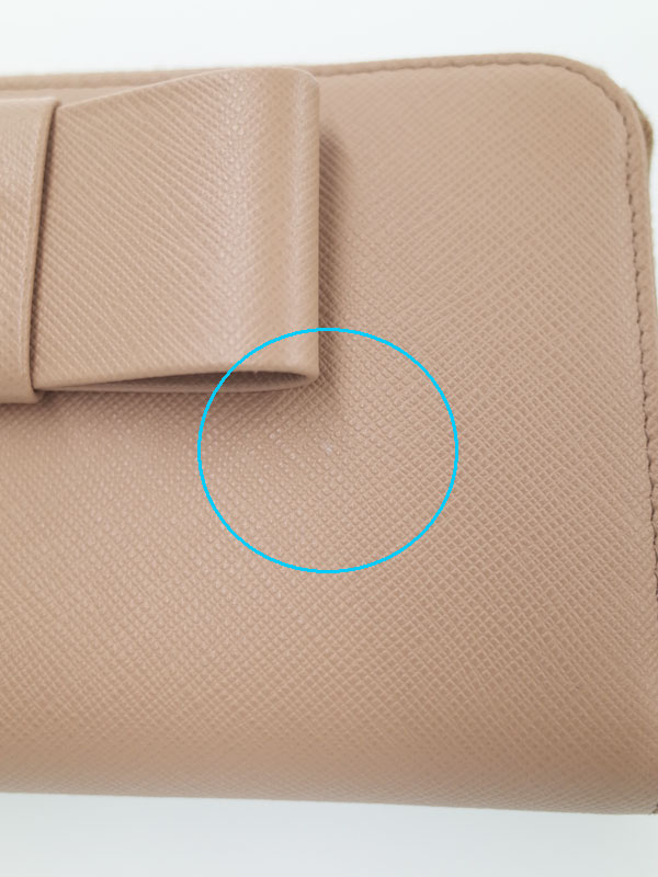 PRADA】プラダ『リボン ラウンドファスナー長財布』1ML506 レディース