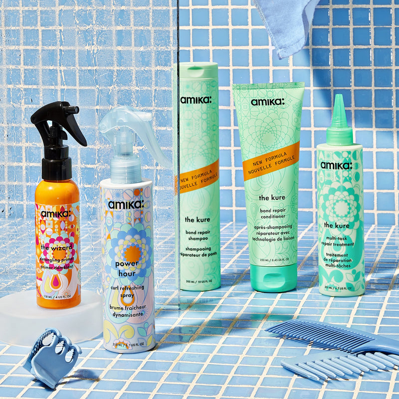 power hour: curl refreshing spray | amika pro