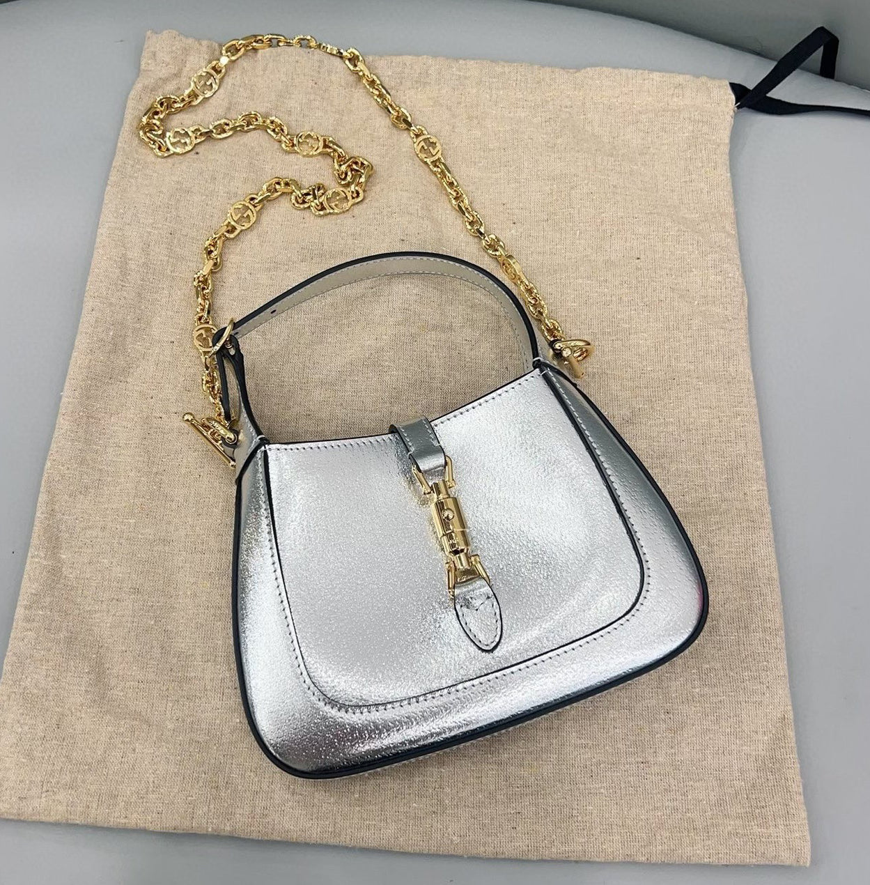 Sold Gucci Jackie 1961 Mini Silver Lamé Leather Bag with Chain