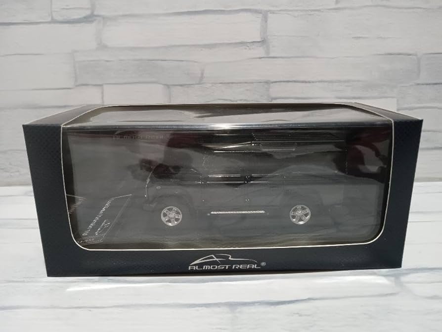 Amazon.co.jp: 1／43 ランドローバー ディフェンダー110 ブラック 2014