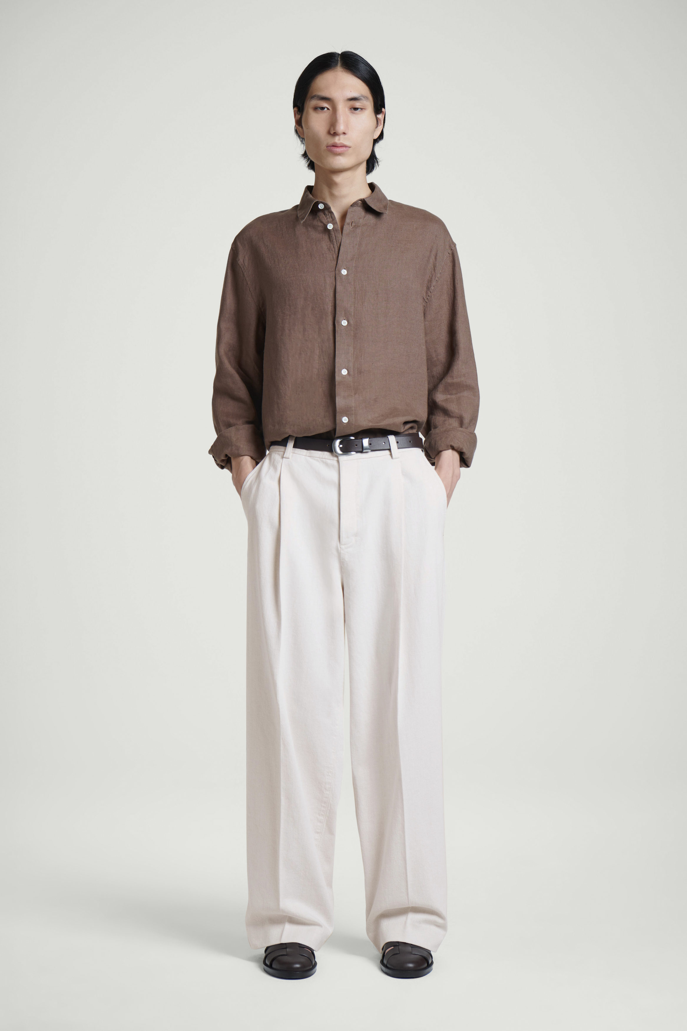 PLEATED RELAXED-FIT WIDE-LEG DENIM TROUSERS - ECRU | COS