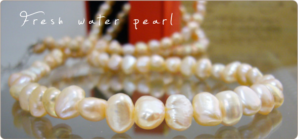 淡水パールネックレス フラットバロック オレンジ 80cm ～一粒一粒形の