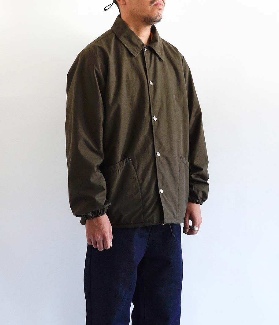 NECESSARY or UNNECESSARY ZIP COACH [BROWN] - Fresh Service