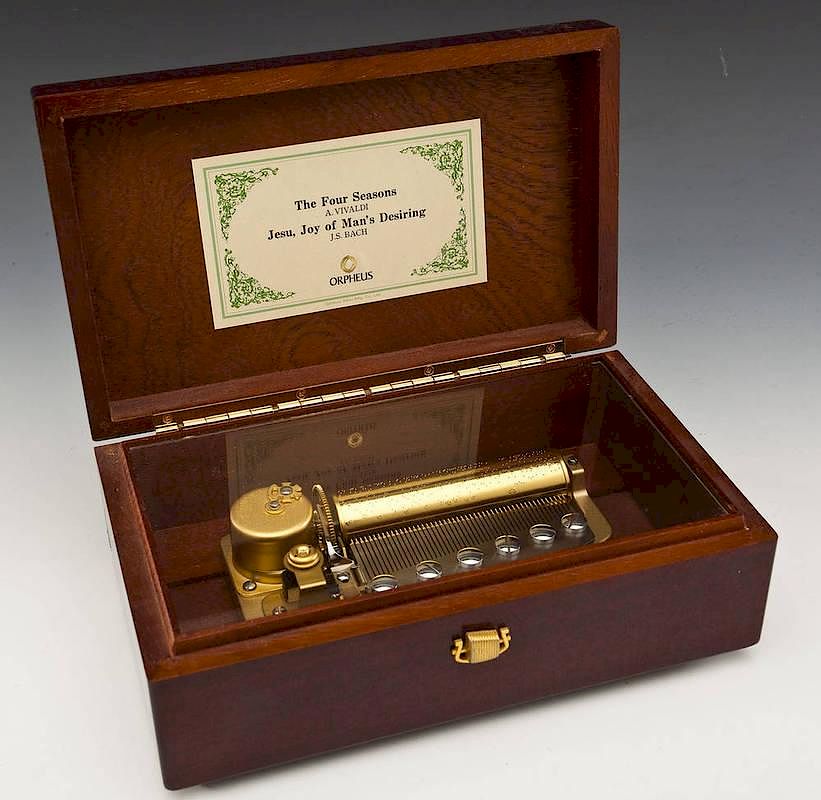 Sankyo Orpheus Mahogany Lidded Music Box sold at auction on 9th
