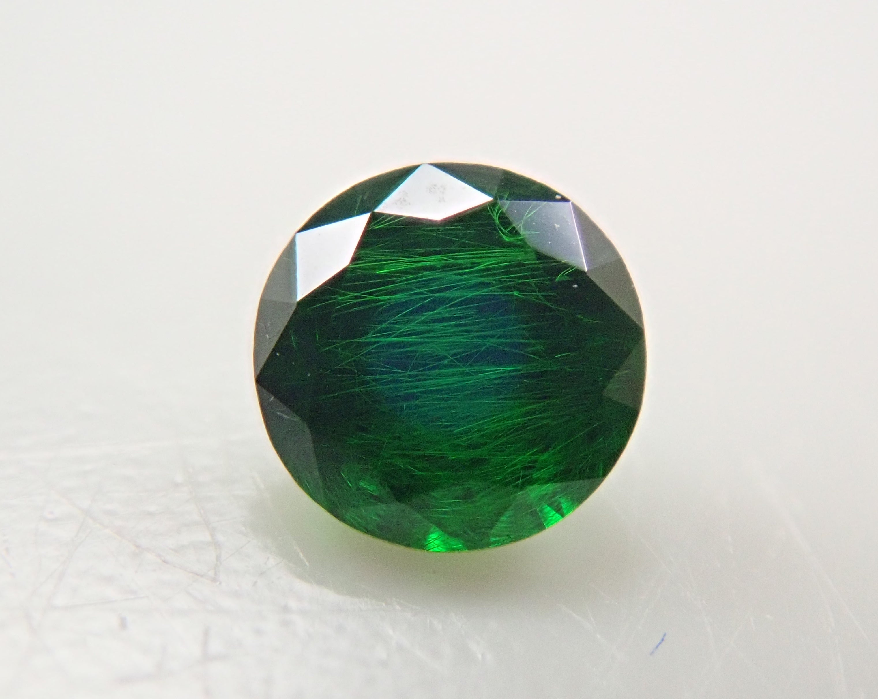 ロシア産デマントイドガーネット（ホーステール認む） 0.063ctルース