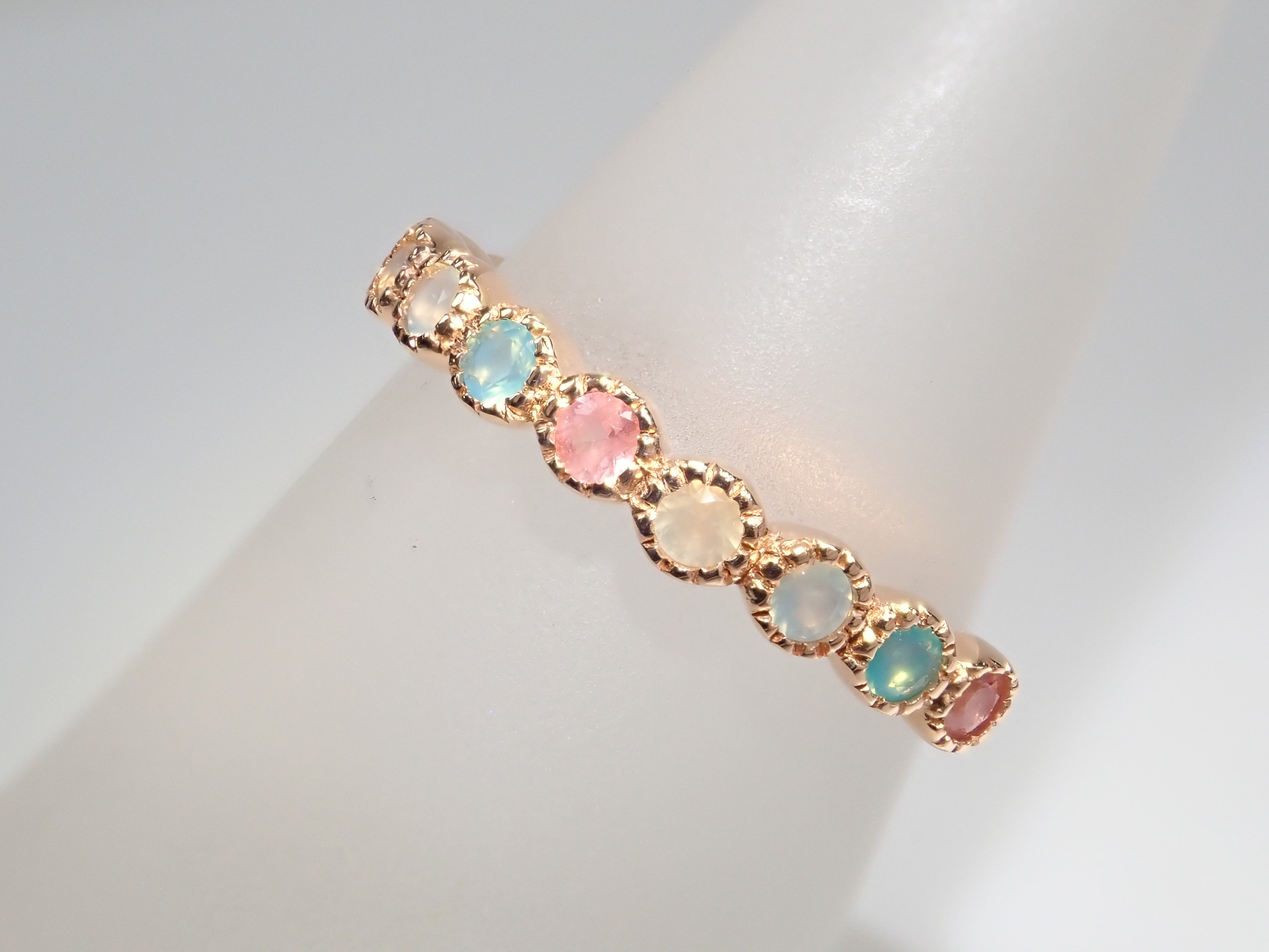 K18YGマダガスカル産ペツォッタイト・アクアブルーカルセドニーハーフ