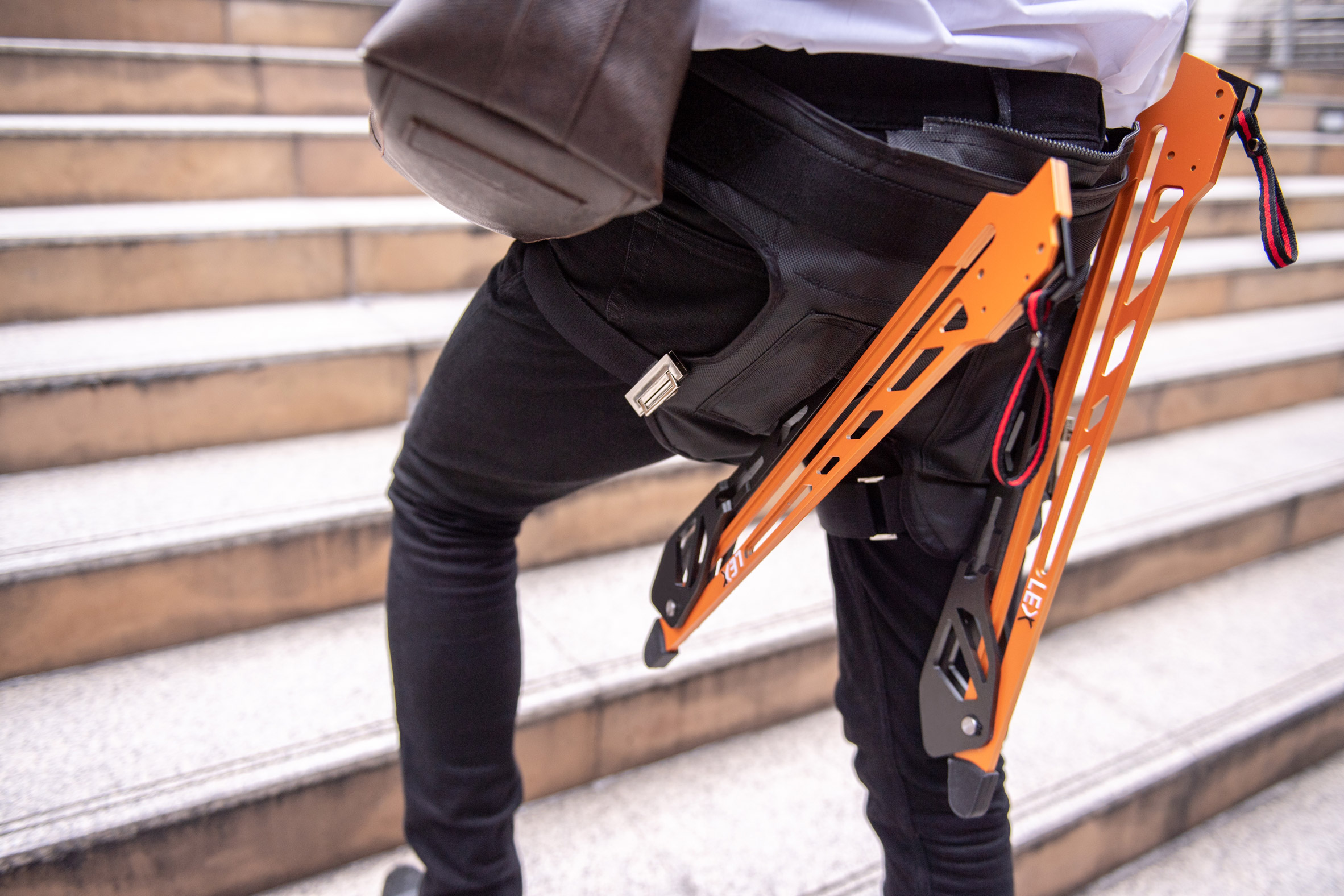 Lex by Astride is a wearable chair that allows its user to sit