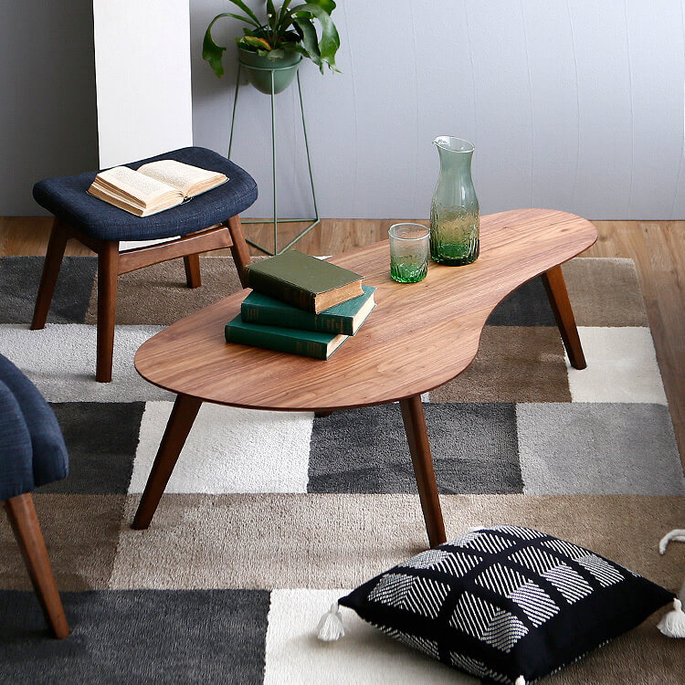 センターテーブル(ウォルナット)変形デザインのキズ防止クッション付き