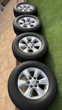 ごま様 送料込みプラド150 純正ホイール 265/65R17 BS 4本セット