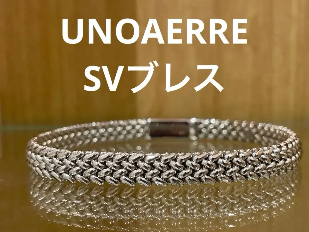 UNOAERRE ツイストデザイン バングルk9
