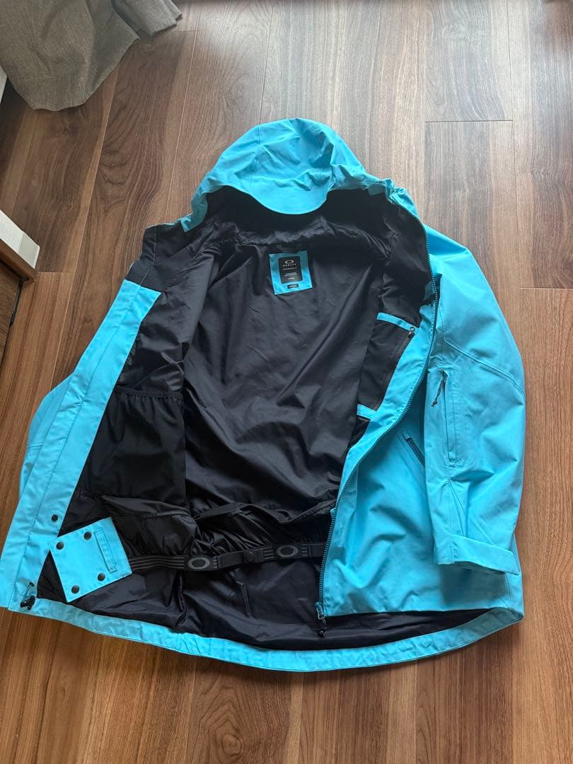 Oakley 防水ジャケット 水色
