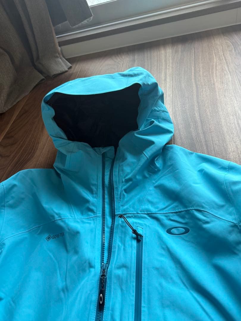 Oakley 防水ジャケット 水色