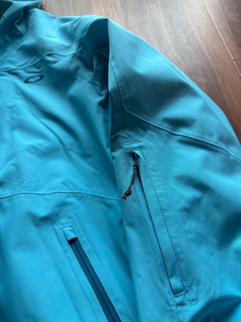 Oakley 防水ジャケット 水色