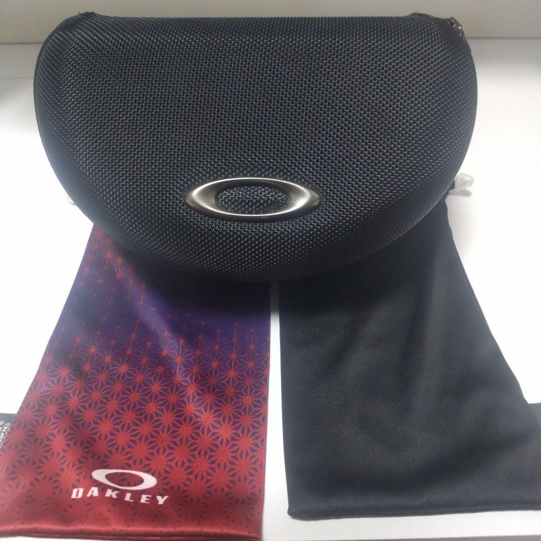 今週末で処分‼️Oakley スポーツメガネ 紫 偏光レンズ ケース付き