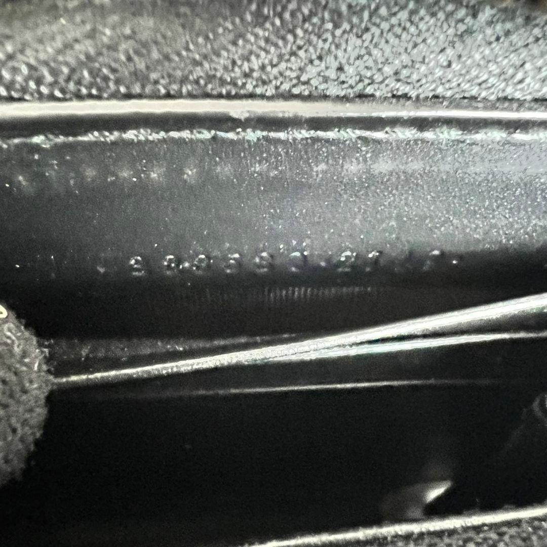 GUCCI GGエンボス インターロッキング リボン金具 ラウンド 長財布