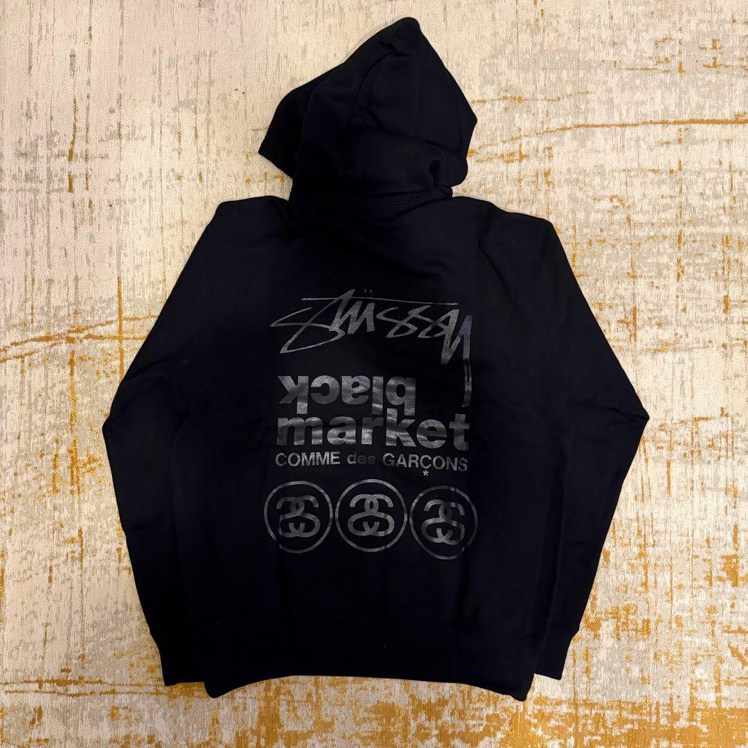 希少】コムデギャルソン STUSSY ブラックマーケット コラボ パーカー