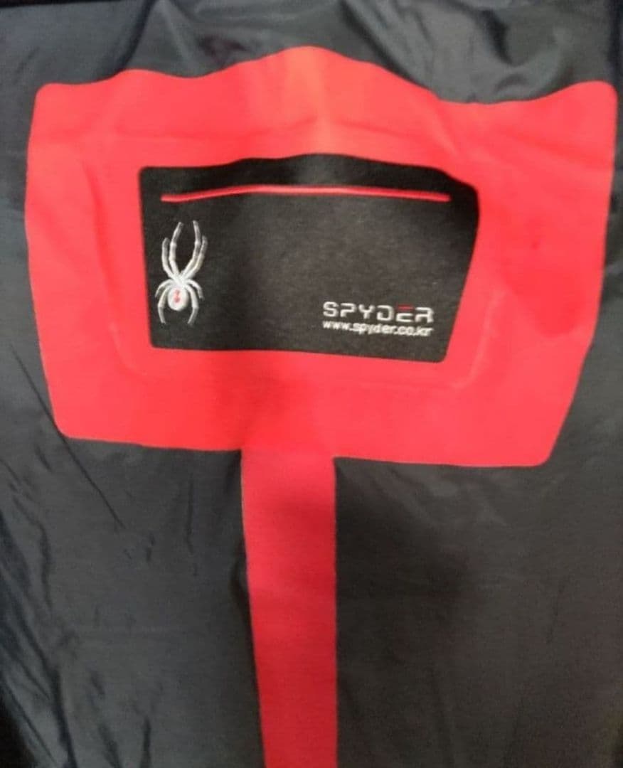 SPYDER スパイダー U.S.SKI TEAM フード付きダウンベスト。