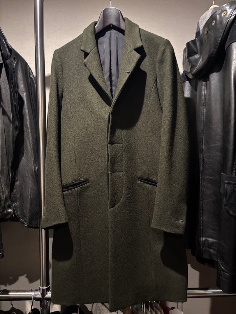 イサムカタヤマバックラッシュカーキチェスターコートスタンドカラーレザー