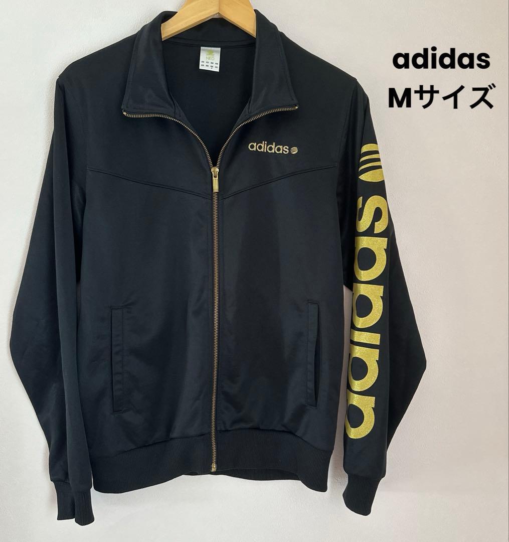 adidas ブラック ジップアップジャケット ゴールドロゴ 刺繍ロゴ