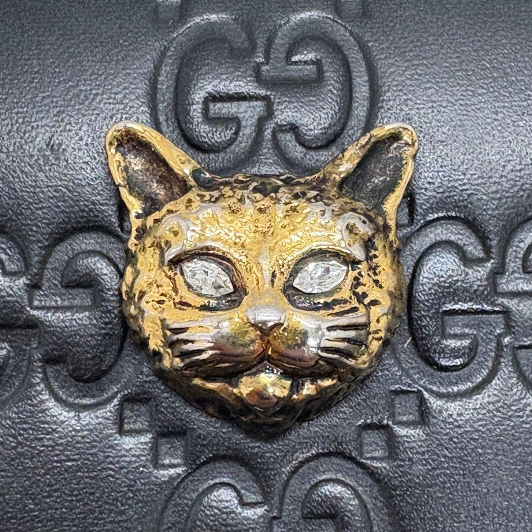 【極美品】 グッチ ラウンドファスナーキャットヘッド ゴールド 金具 ブラック