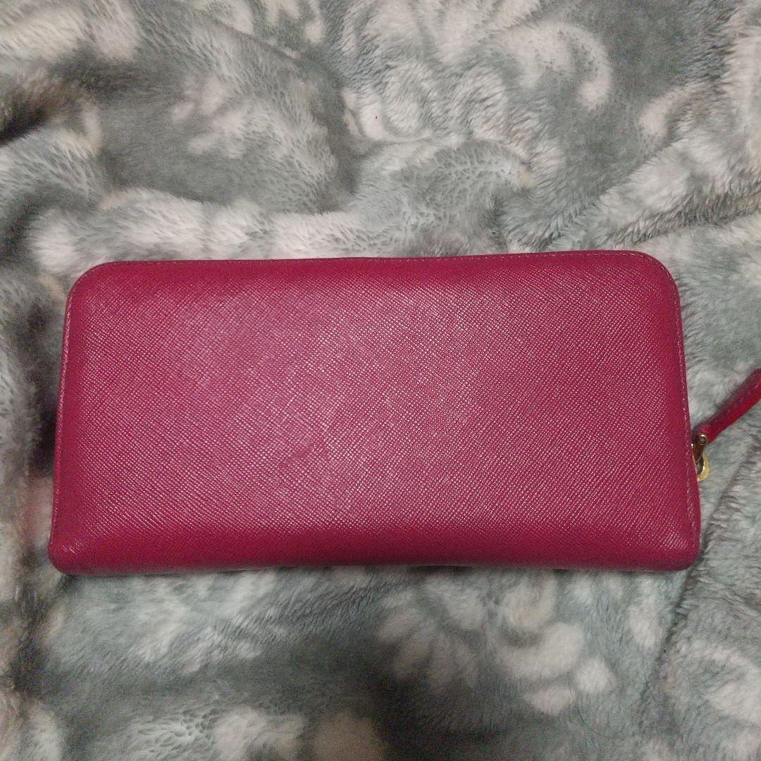 PRADA サフィアーノラウンドファスナー 長財布 リボン付き - メルカリ