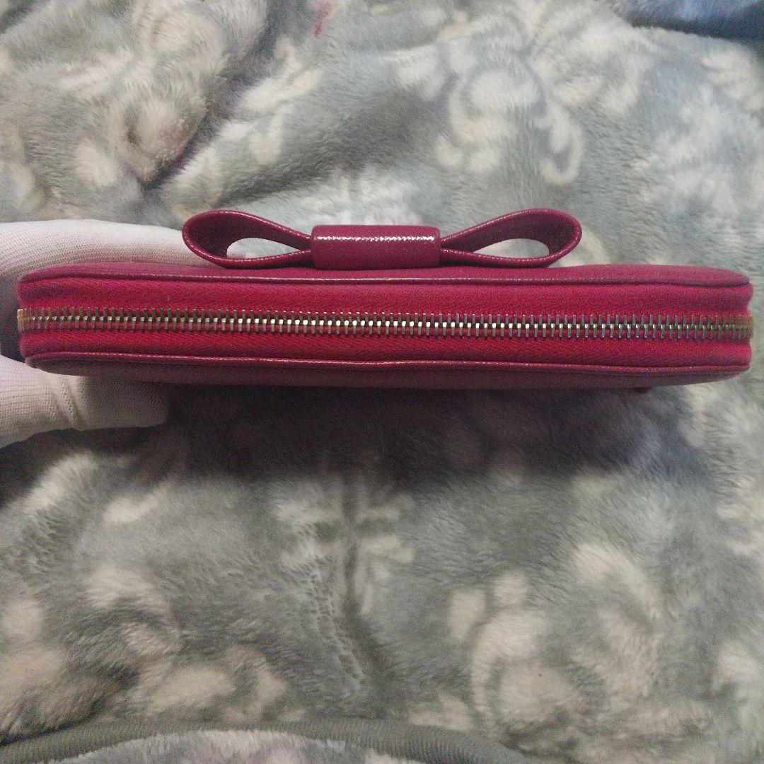 PRADA サフィアーノラウンドファスナー 長財布 リボン付き - メルカリ