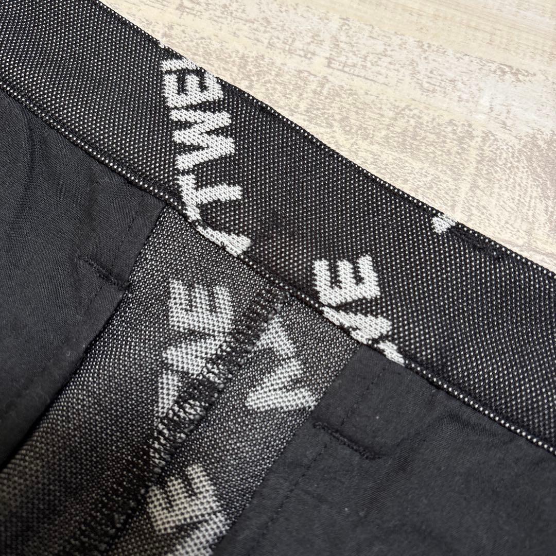 ヴィ・トゥエルヴ★ロゴ総柄★全方向ストレッチ★パンツ 【メンズ サイズL】