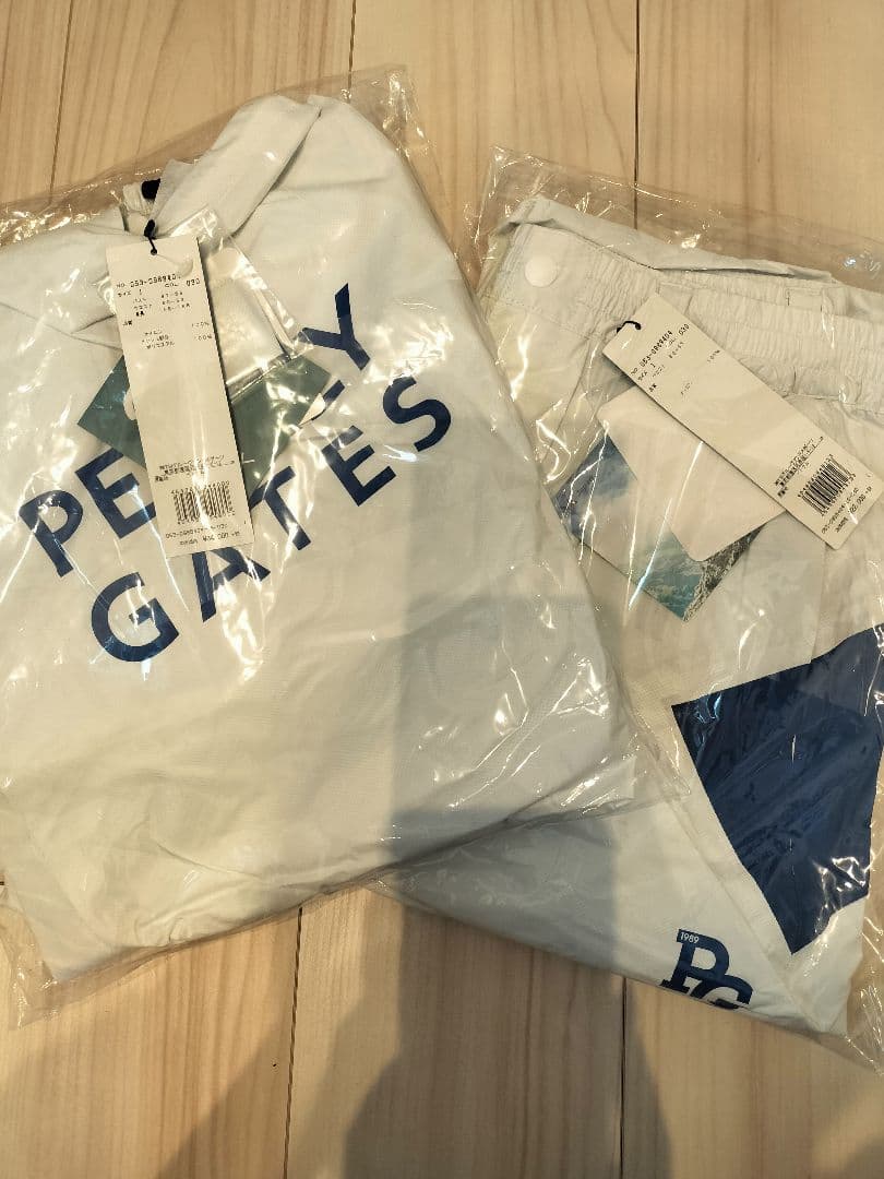 値引中！新品PEARLYGATESレインウェア　上下セット白サイズ1定価5万以上