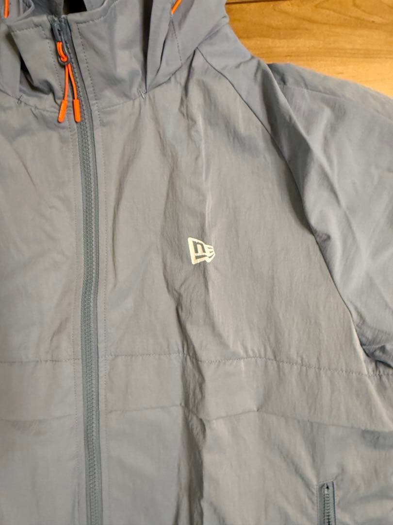 ニューエラフード付きライトブルージャケット M