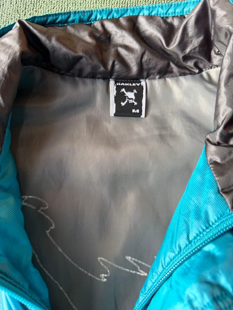 Oakley skullターコイズ 中綿プルオーバージャケット M