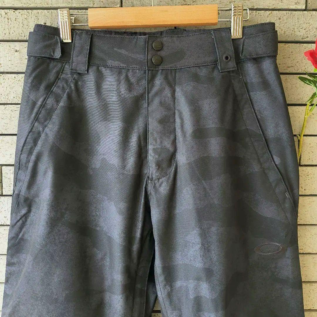 ♠ああ【オークリー】✨新品未使用　スノボードパンツ　ネイビーカモフラージュ