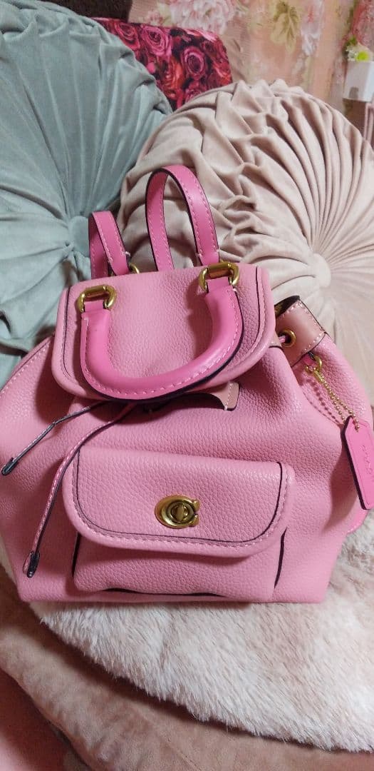 COACHのリュックピンク 小型 レザー