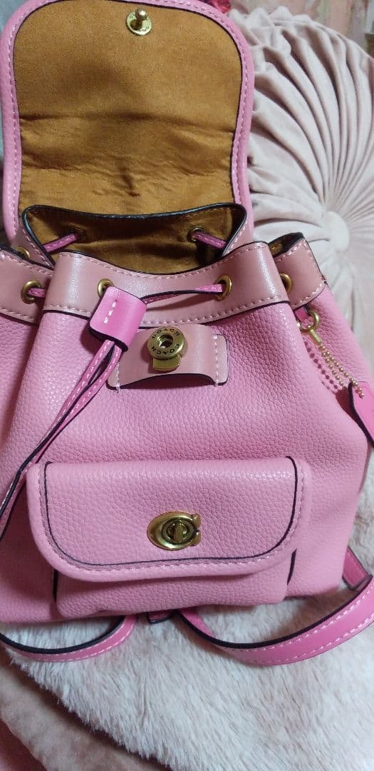 COACHのリュックピンク 小型 レザー