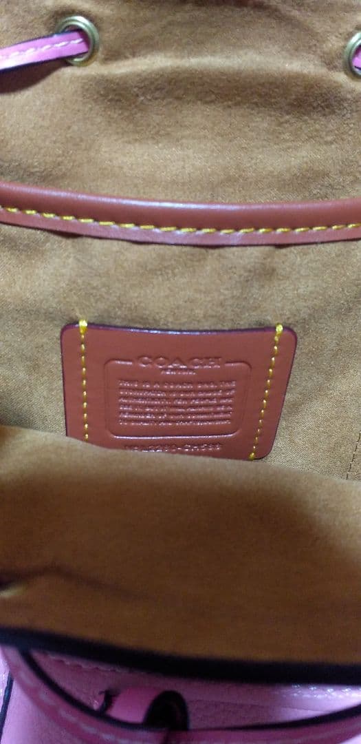 COACHのリュックピンク 小型 レザー