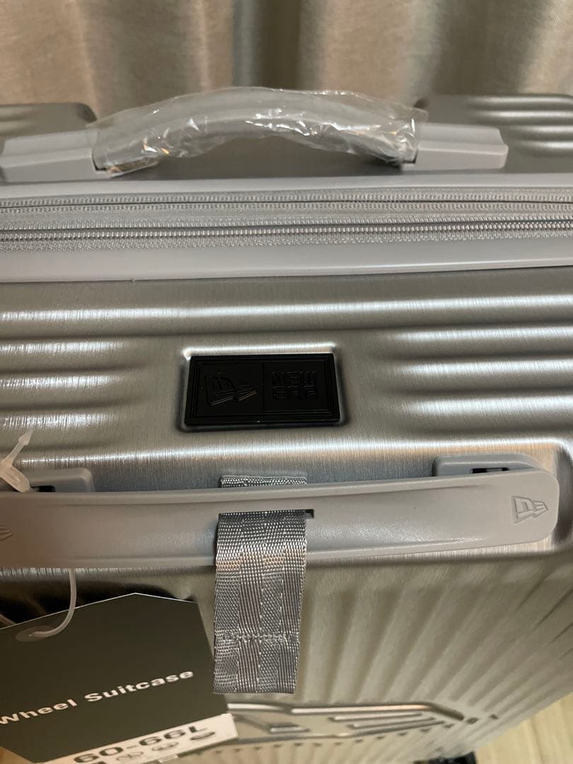 NEW ERAキャリーケース 60-66Lシルバー