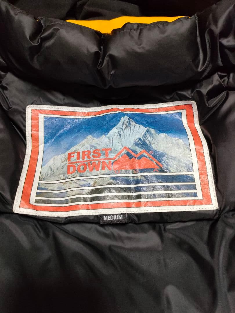 first down フリークスストア別注パネルダウン　イエローМサイズ