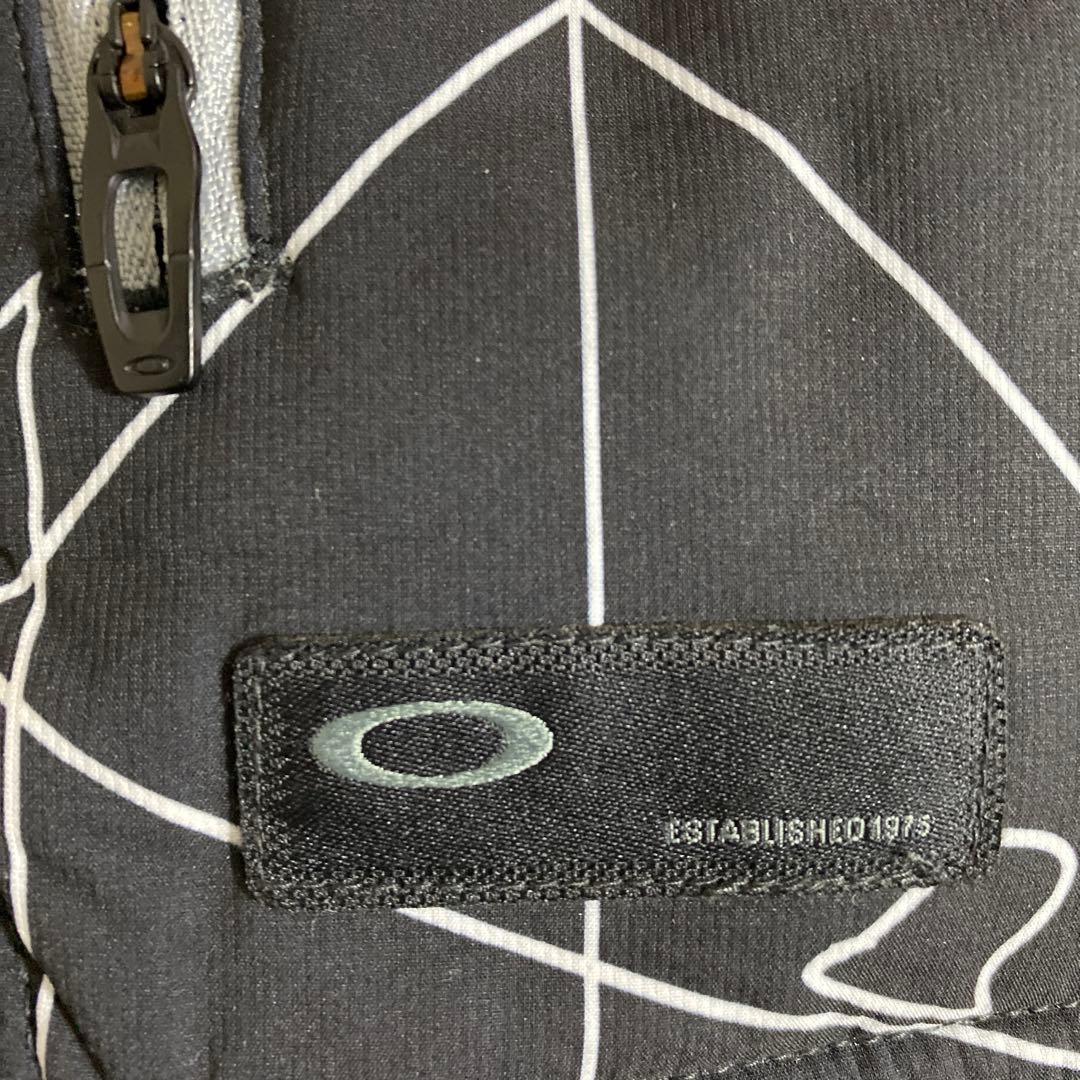 美品OAKLEYオークリーメンズ ゴルフ リバーシブル長袖ウインドブレーカー M