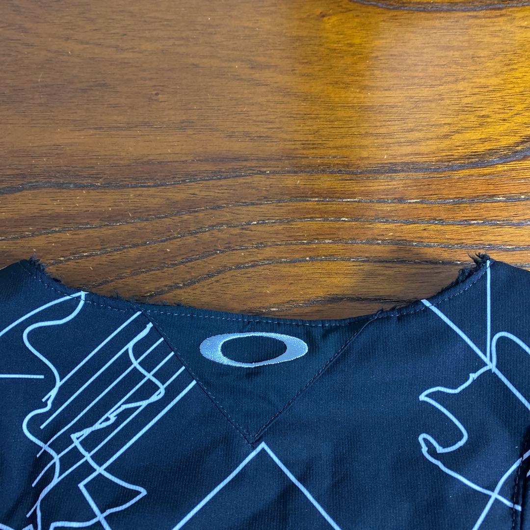 美品OAKLEYオークリーメンズ ゴルフ リバーシブル長袖ウインドブレーカー M