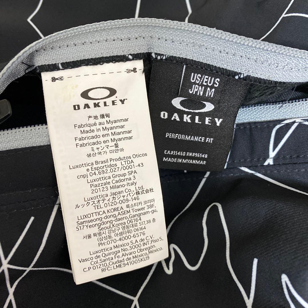 美品OAKLEYオークリーメンズ ゴルフ リバーシブル長袖ウインドブレーカー M