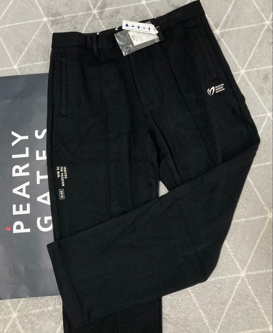 新品 パーリーゲイツ マスターバニー ソリストヒート ツイルパンツ(5)L/黒