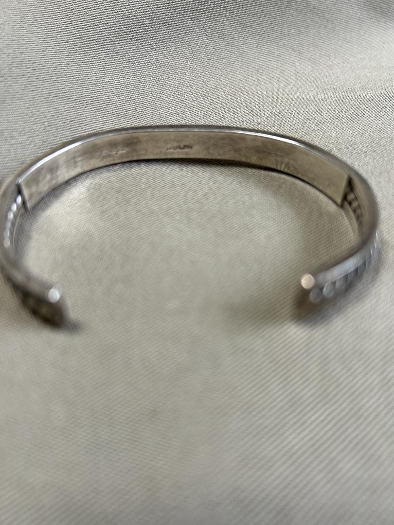 ナバホ族　ターコイズ・オレンジ他 シルバーバングル(Jダグラス )お値下げ